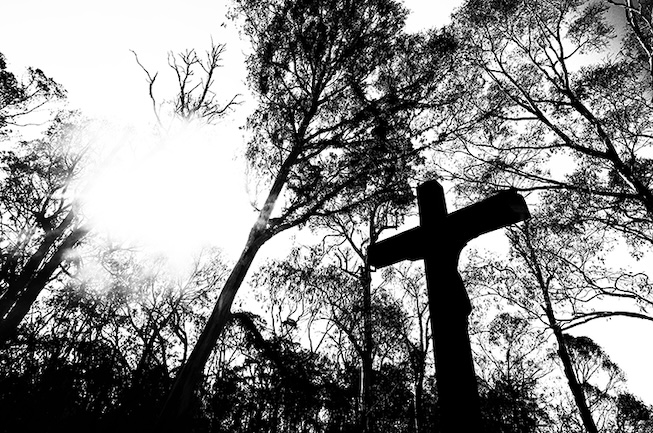 A phoenix from the ashes: Caveat crucifix denies bushfire